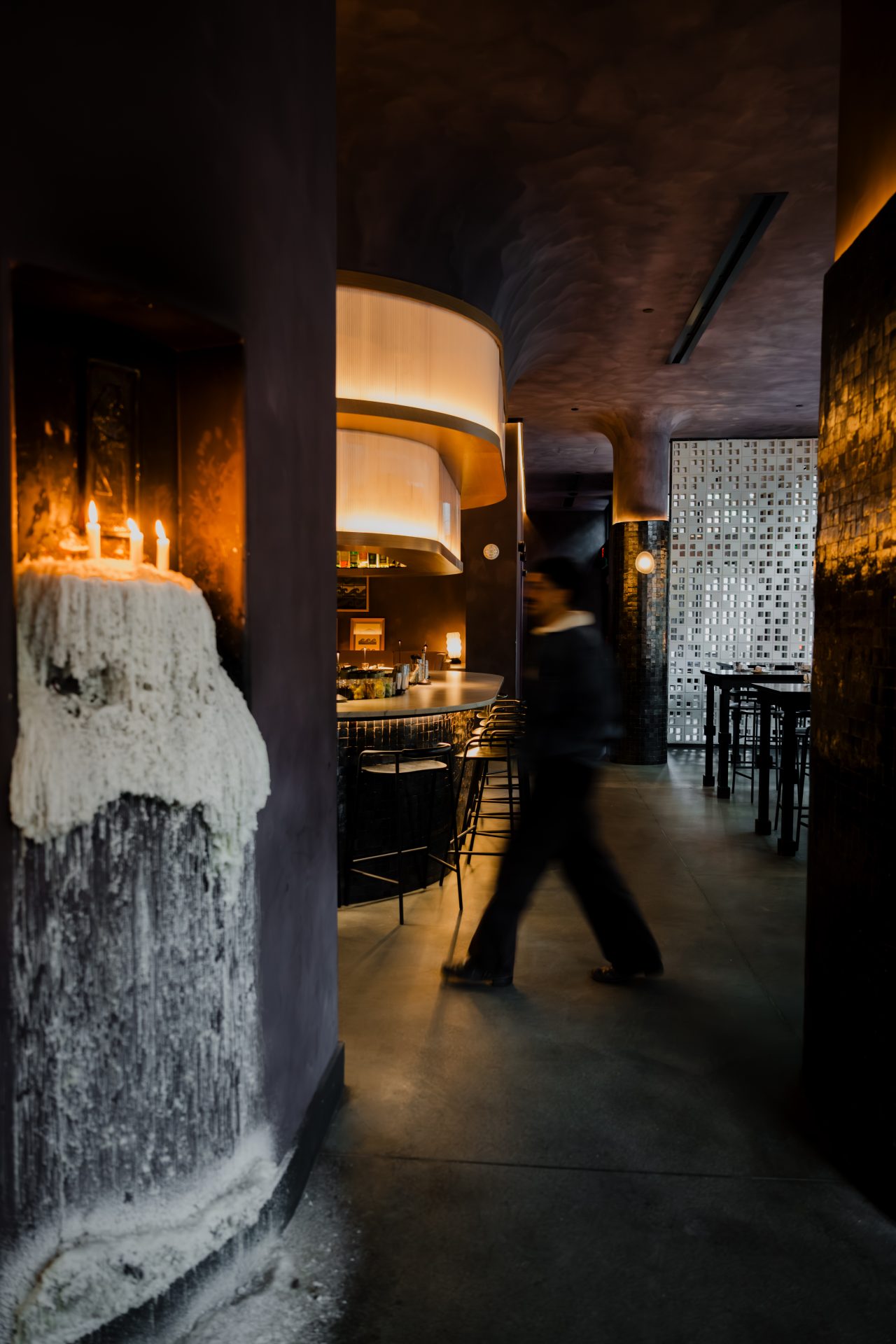 Moody upscale restaurant or bar interior with warm ambient lighting