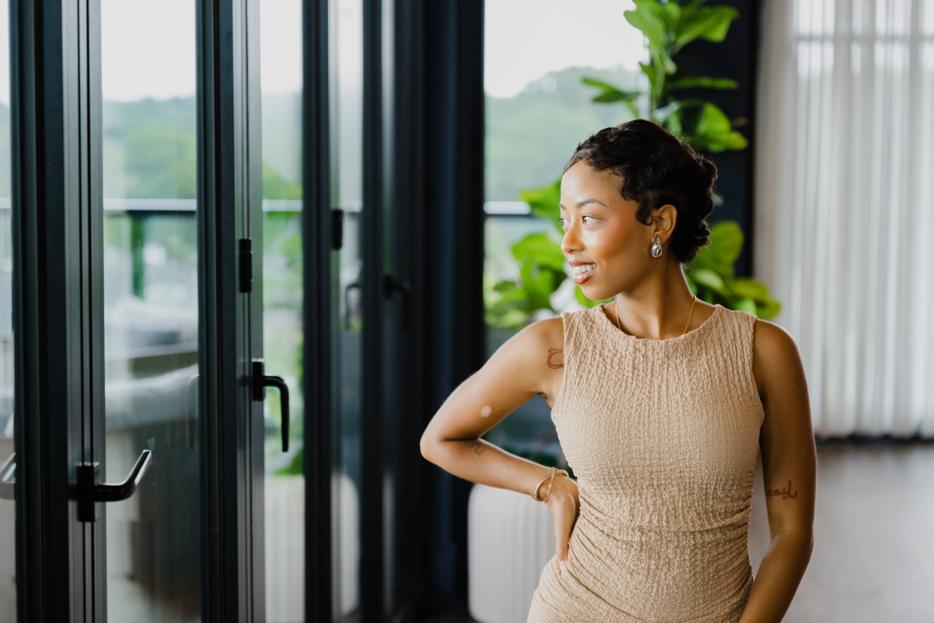 Resident posing confidently in a modern gym